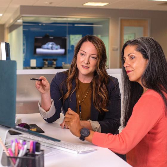 Investment professionals using DEALPRINT platform for deal analysis